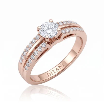 Rose gold engagement ring with a round center diamond and pavé diamonds along the band.