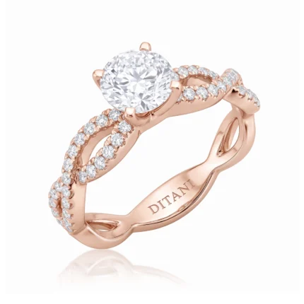 Rose gold engagement ring with a large center diamond and pavé diamonds along the split shank, engraved DITANI inside.
