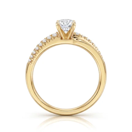 Yellow gold engagement ring with a high-diamond solitaire and pavé diamonds along the band.