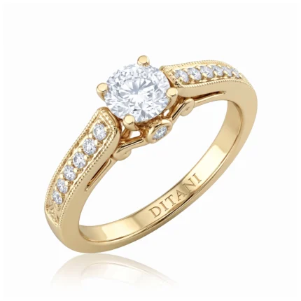 Gold ring in yellow gold with a large round-cut center diamond and pavé diamonds along the band shoulders, engraved 'DITANI' inside the band.