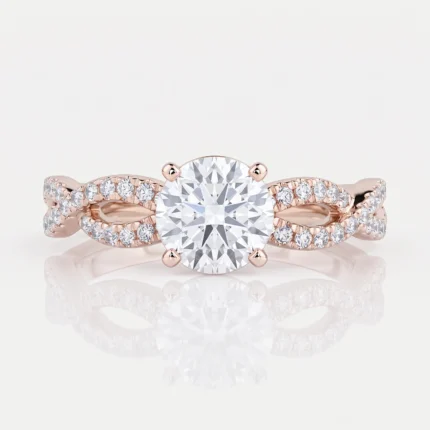Rose gold engagement ring with a large round central diamond and pavé-set diamonds along the split shank band.