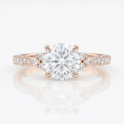 Rose gold engagement ring with a large round center diamond and small side diamonds along the band