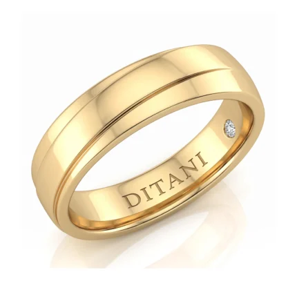 Gold ring with a polished surface, a small diamond inset, and DITANI engraved inside the band.