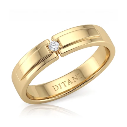 Gold band ring with a single diamond solitaire in a square setting, engraved inside with DITANII.