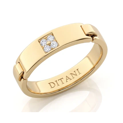 Gold ring with a square cluster of four diamonds and 'DITANI' engraved on the inner band.