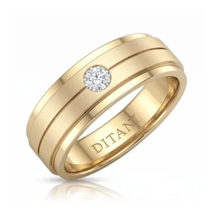Gold ring with a single round diamond set in a flush bezel, inner engraving 'DITANI'.