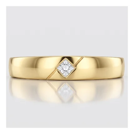 Gold band ring with a square-cut diamond setting at the center and a polished shine.