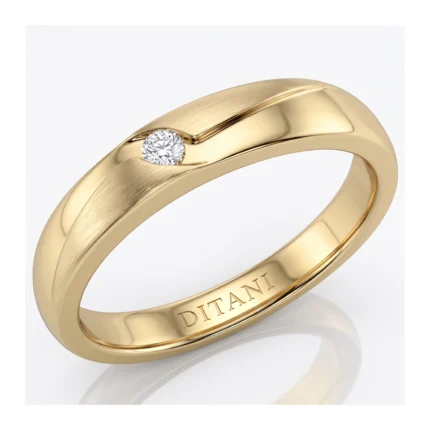 Gold ring with a brushed center band and a single diamond set into the side, inner 'DITANI' inscription visible