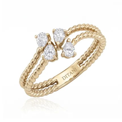 Gold ring with a braided rope band and multiple diamonds set in prongs, elegant and sparkling.
