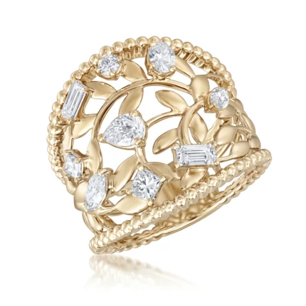 Gold ring with a leafy vine design and multiple diamond stones set along the band, decorative beaded edge visible in gold