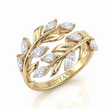 Gold ring with a leafy vine design set with marquise-cut diamonds and a polished inner band engraved DITANI