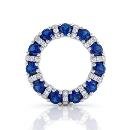 Round eternity ring with alternating blue sapphires and diamonds in white metal setting, full circle design.