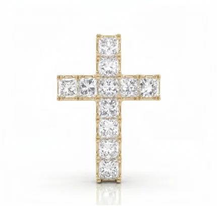 Gold cross pendant encrusted with square-cut diamonds on a white background