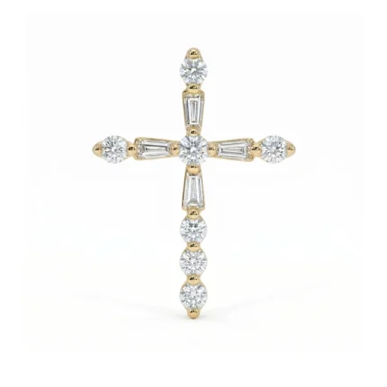 Gold cross pendant adorned with round and baguette diamonds against a white background, highlighting the jewelry piece.