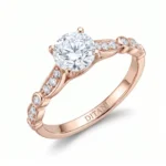 Rose gold engagement ring with a large round center diamond and pavé diamonds along the twisted band; ‘DITANI’ engraved inside.