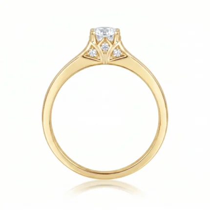 Gold ring with a prominent central diamond and three smaller diamonds set in a fan-shaped decorative gallery.