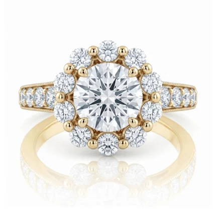 Yellow gold engagement ring with a large central diamond surrounded by a halo of smaller diamonds.