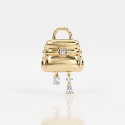 Gold handbag pendant with a square diamond clasp and two dangling diamond charms against a light background, showcasing a polished, reflective surface.