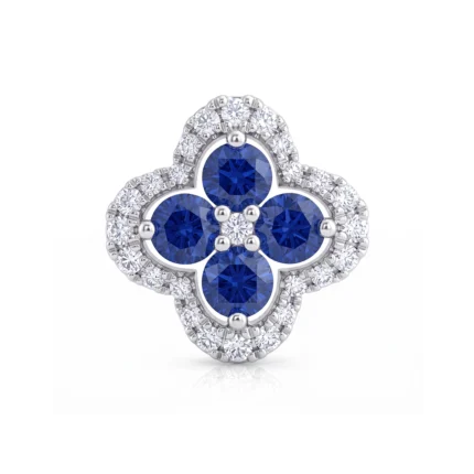 Four-leaf clover-shaped ring with four round blue sapphires surrounded by diamonds in a silver setting, jewelry accessory.