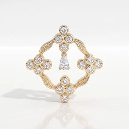 Gold ring with diamond clusters arranged in a cross-like frame and a hanging pear-cut diamond centerpiece.