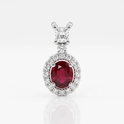 Pendant with an oval red gemstone encircled by a halo of diamonds in a white-gold setting