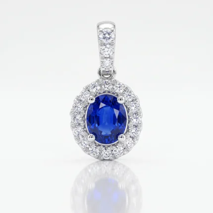 Oval blue sapphire pendant surrounded by a halo of diamonds in white metal, on a white background.