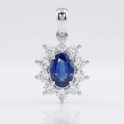 Silver pendant with an oval blue sapphire at center, surrounded by a flower-shaped halo of diamonds.