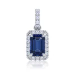 Pendant with a large rectangular blue gemstone surrounded by a diamond halo in a silver setting.