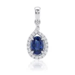 Teardrop pendant with a deep blue oval sapphire, encircled by diamonds in a white-gold setting.