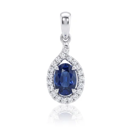 Teardrop pendant with a deep blue oval sapphire, encircled by diamonds in a white-gold setting.