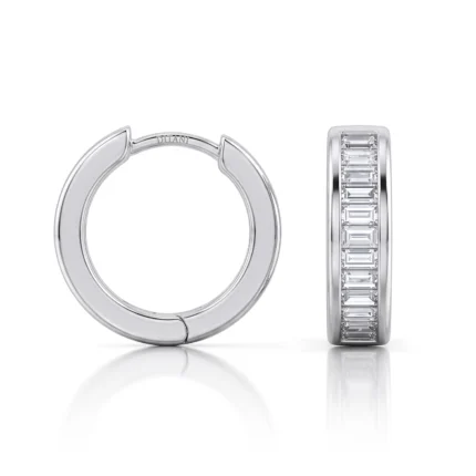 Silver hoop earring and matching diamond-studded ring shown side by side on a white background.