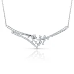 Silver necklace with two curved diamond-encrusted bars forming a V, connected by a cluster of diamonds at the center.