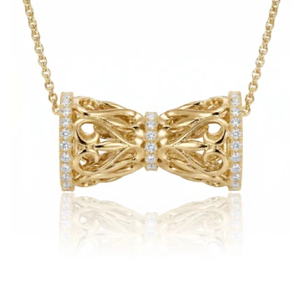 Gold bow-shaped pendant necklace with diamond accents along the edges, hanging from a delicate gold chain.