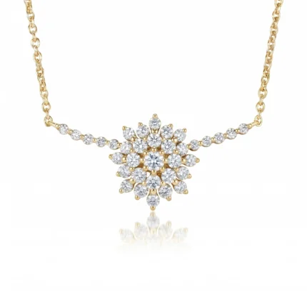 Gold chain necklace with a snowflake-shaped cluster of diamonds as the pendant, center-focused design.