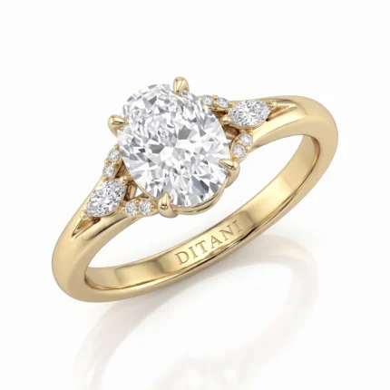 Gold ring featuring a large central diamond with smaller diamonds along the band and 'DITANT' engraved on the inner band.