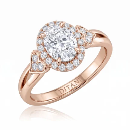 Rose gold halo engagement ring with a large central diamond surrounded by a diamond halo and heart-shaped lattice accents on the sides.