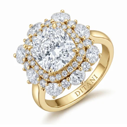 Yellow-gold ring with a cushion-cut center diamond surrounded by two halos of smaller diamonds