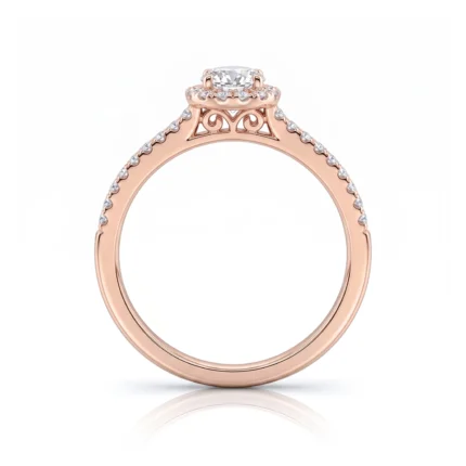 Rose gold engagement ring with a round center diamond and pavé diamonds along the band, featuring decorative filigree at the head.