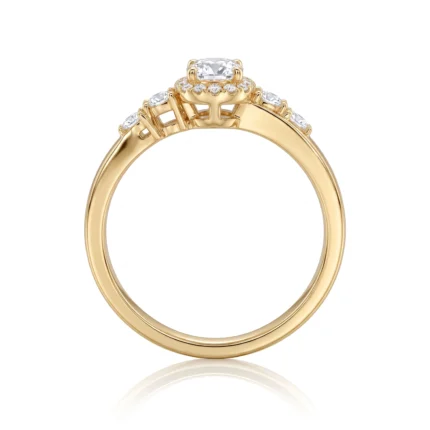 Gold ring with a central rectangular diamond and smaller diamonds along the band, solitaire style with a halo of diamonds on top edge - product photo