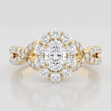 Gold engagement ring with a large central diamond surrounded by a halo of smaller diamonds set in a yellow gold band.