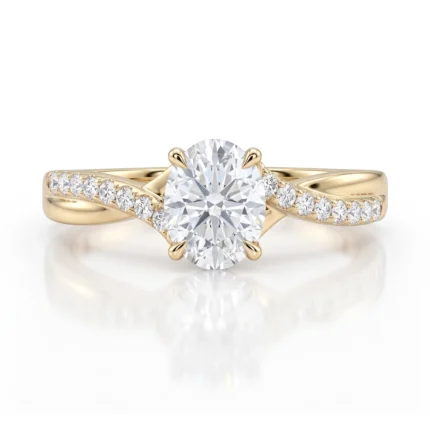 Gold engagement ring with a large round-cut center diamond held by four prongs and a diamond-accented band along a split shank.