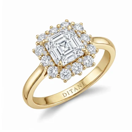 Gold ring with a large emerald-cut center diamond surrounded by a halo of smaller diamonds.
