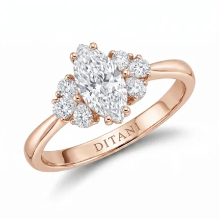 Rose gold engagement ring with a large marquise-cut center diamond surrounded by smaller round diamonds in a floral halo.
