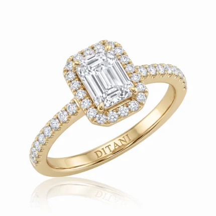 Yellow gold engagement ring with an emerald-cut center diamond surrounded by a halo of round diamonds and a diamond-studded band; DITANI engraving inside.