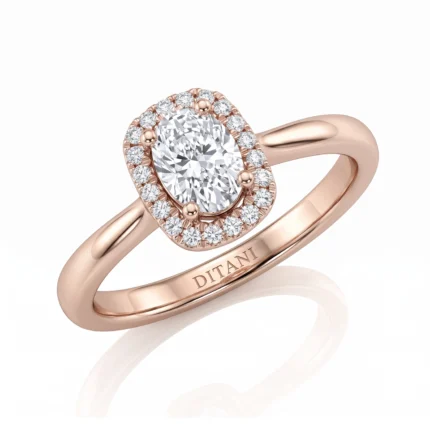 Rose gold ring with oval center diamond encircled by a diamond halo; 'DITANI' engraved on the band.