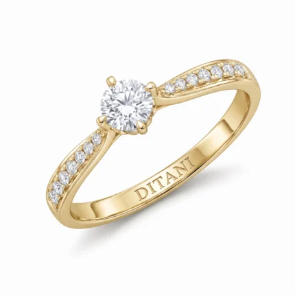 Gold ring with a round center diamond and pavé diamonds along the shoulders; inner band stamped DITANI