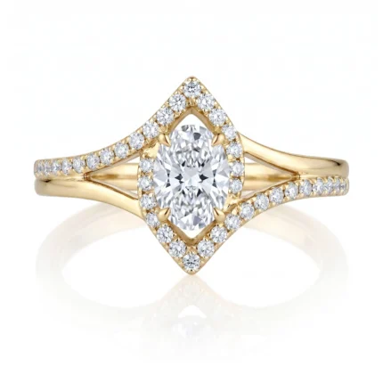 Gold ring with a central round diamond surrounded by a diamond halo in a marquise-shaped frame and pavé diamonds along the split shank