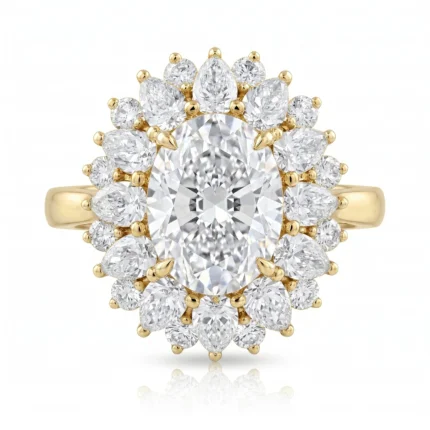 Gold ring with a large oval center diamond surrounded by a halo of pear-shaped diamonds in yellow gold