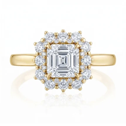 Gold ring with a square emerald-cut center diamond surrounded by a halo of smaller diamonds you can see from the top surface. The band is yellow gold.