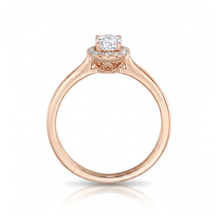 Rose gold ring with a halo of small diamonds surrounding a central round diamond, shown from the side to highlight the setting.
